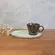Xícara de Café e Pires Oval Cerâmica Stoneware Metálica Neo Pistache 110ml - 1 Unid.